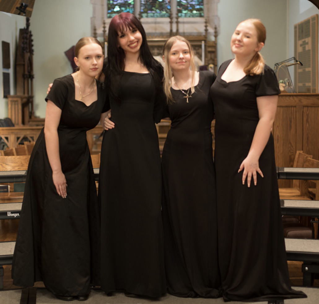 four singers on risers 2